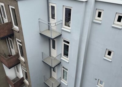 Renovatie achtergevel en balkons na situatie
